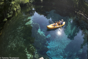 Paddling means staying dry and not getting wet!  Here's a dad and son enjoying Blue Springs in Gilchrist County.