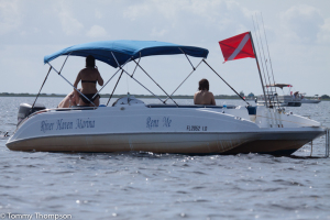 Rent a deck boat from River Haven Marina for $200 a day, plus gas and tax.