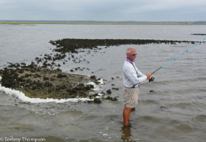 Wading give you the advantage of stealth when fishing for black drum and redfish.