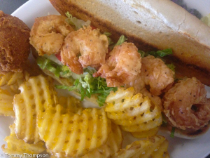 Fresh Gulf shrimp, fried in homemade buttermilk batter, is highly recommended, either as an entree or in a po-boy sandwich for lunch.