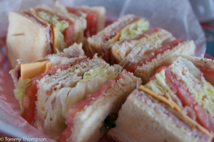 ...or "settle" from a landlubber treat--their famous Club Sandwich!