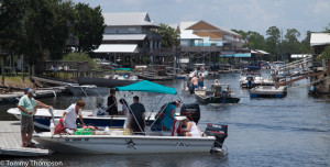 After a busy day of scalloping, crowds at Keaton Beach, awaiting a turn at the boat ramp.