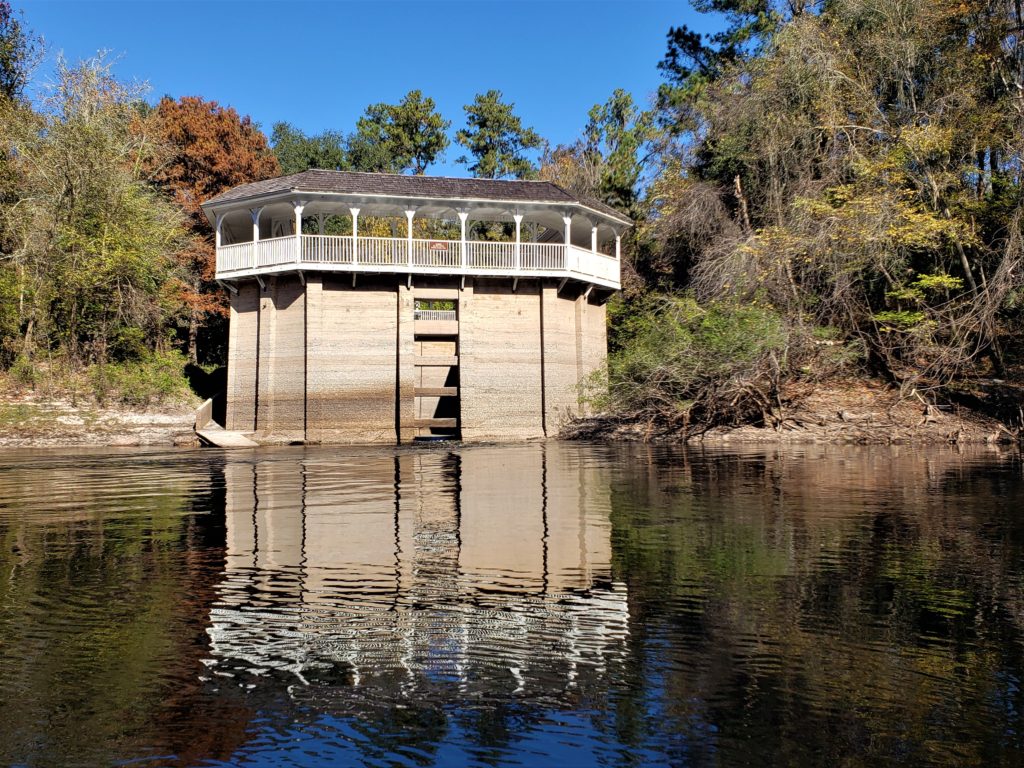 the White Sulphur Spring bathhouse from the river